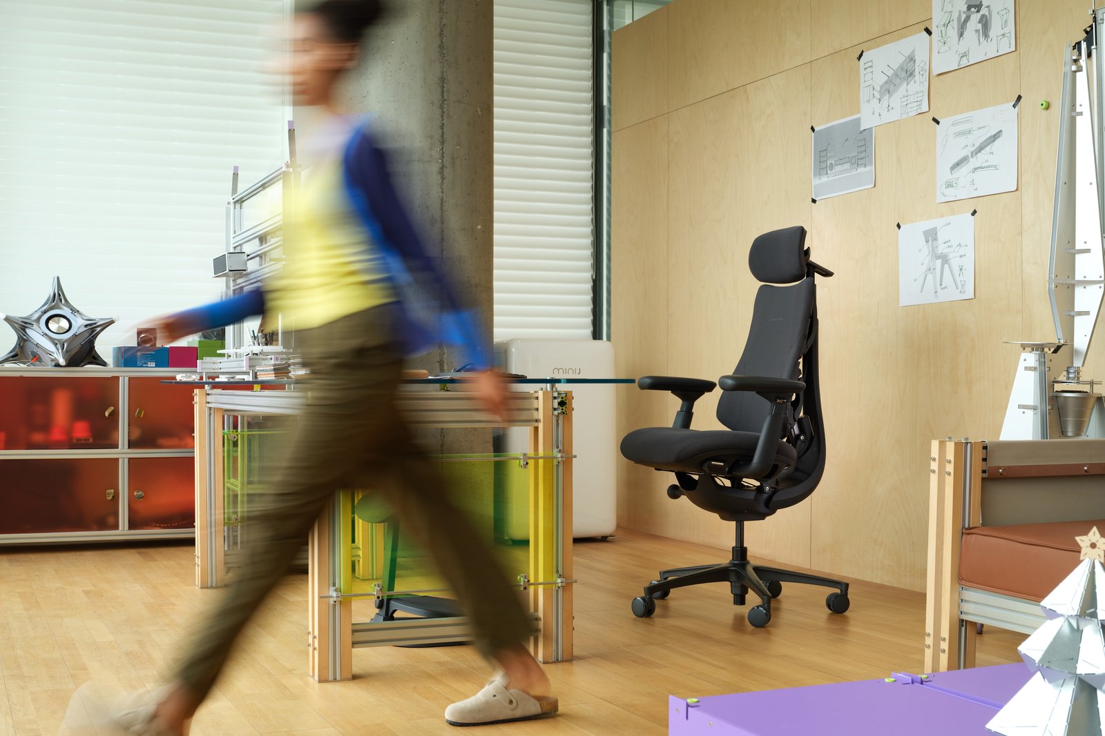 Ergonomic office chair at a desk, illustrating prolonged sitting